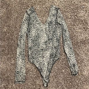 Small mesh cheetah body suit, gently used